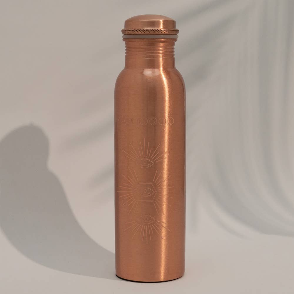 Botella de agua de cobre puro grabada con sol ± 950 ml (pesada