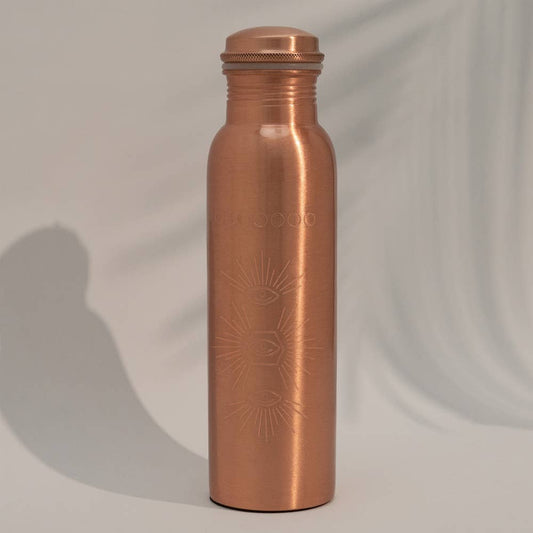 Botella de agua de cobre puro grabada con sol ± 950 ml (pesada