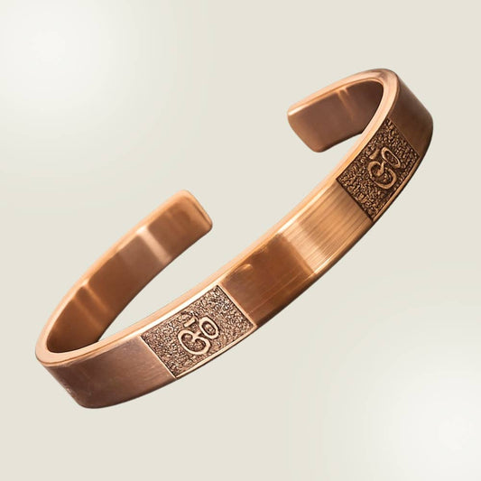 Pulsera de cobre con símbolos Ohm