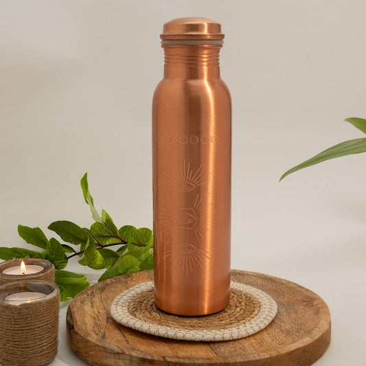 Botella de agua de cobre puro grabada con sol ± 950 ml (pesada